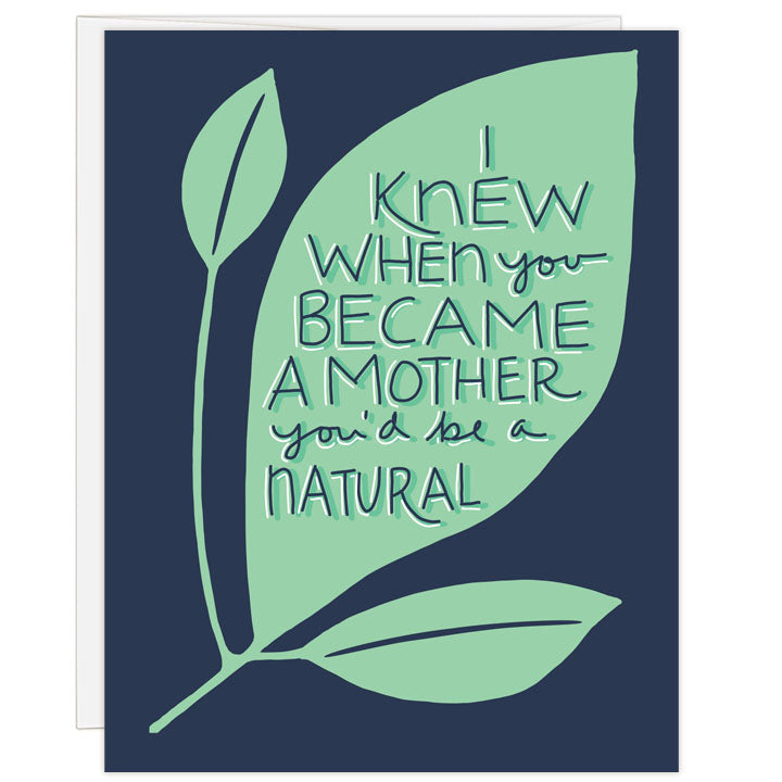 Boldly illustrated card with deep blue and mint green. Leaf motif with illustrated text: I knew when you became a mother you'd be a natural. Honoring Mother's Day card especially from a spouse to a new mom or a mother to a daughter who has become a mom.