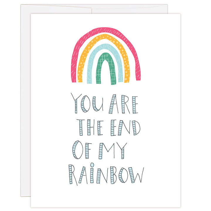 4.25 x 5.5 inch greeting card. Blank inside. Simple and charming illustration style. Title You Are The End Of My Rainbow. White background with brightly colored rainbow above large title.