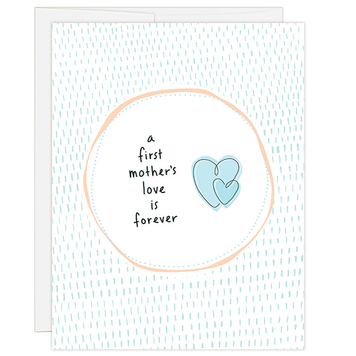 4.25 x 5.5 inch birth mother greeting card. Blank inside. Simple and charming illustration style. Title A First Mother’s Love Is Forever. White background with blue dashes. Headline is contained within a white circle and two interlaced heart graphic.