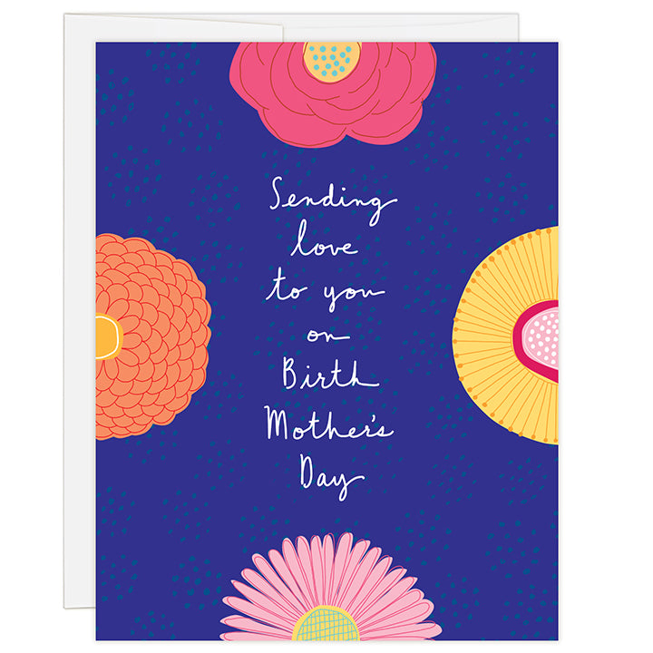 4.25 x 5.5 inch greeting card. Blank inside. Simple and charming illustration style. Title Sending love to you on birth mother’s day. Title is white on royal blue background surrounded by 4 large colorful flowers that bleed off all 4 sides of the card.  
