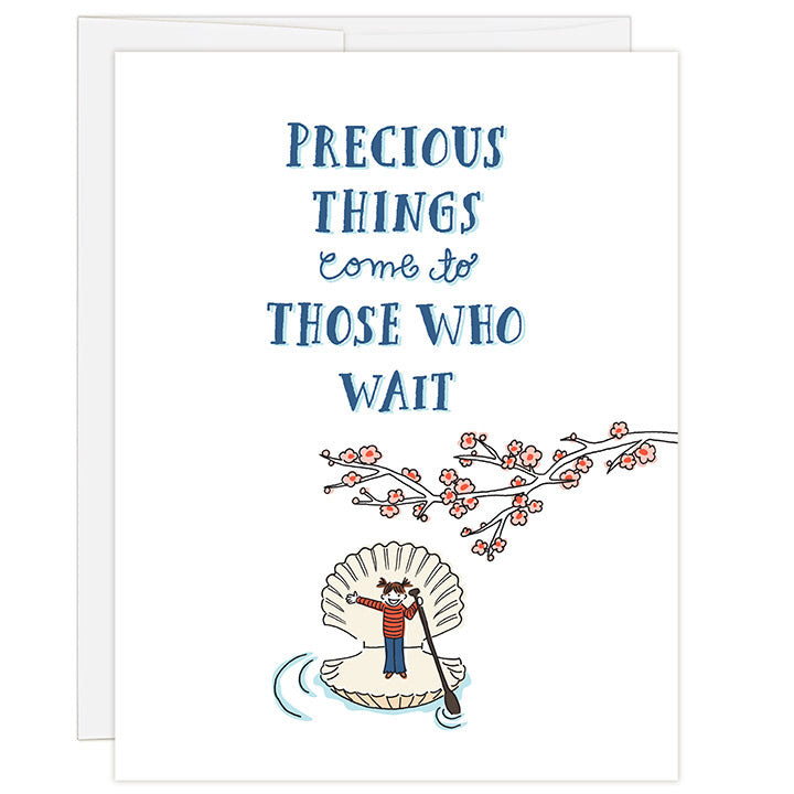 4.25 x 5.5 inch greeting card. Blank inside. Simple and charming illustration style. Title Precious Things Come To Those Who Wait. Simple drawing of a little girl with pig tails stands in an open sea shell holding a paddle in one hand while paddling in the water. Drawing of a simple cherry blossom branch rests above her.